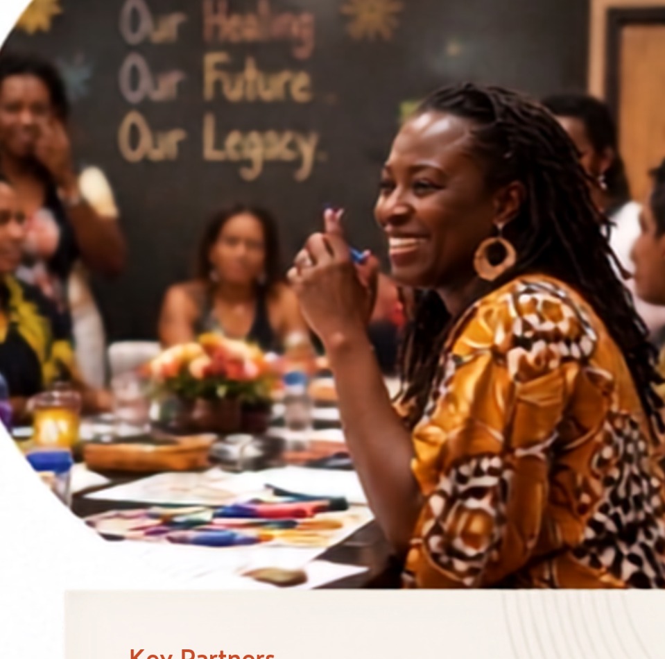 A community leader smiling during a healing and visioning gathering with residents and philanthropic partners